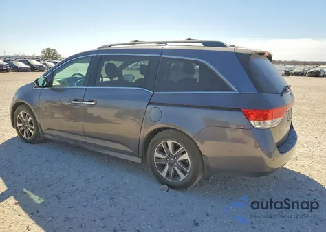 2014 Honda Odyssey Touring z USA, uszkodzony, nr VIN 5FNRL5H94EB009890